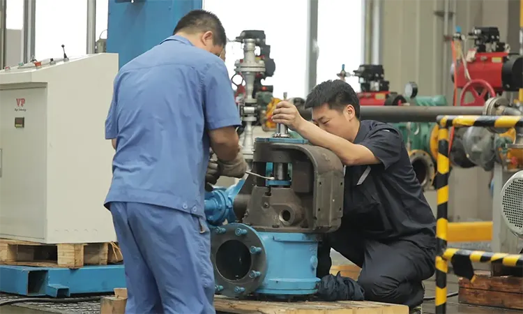 VP Technicians Assembling the Pump